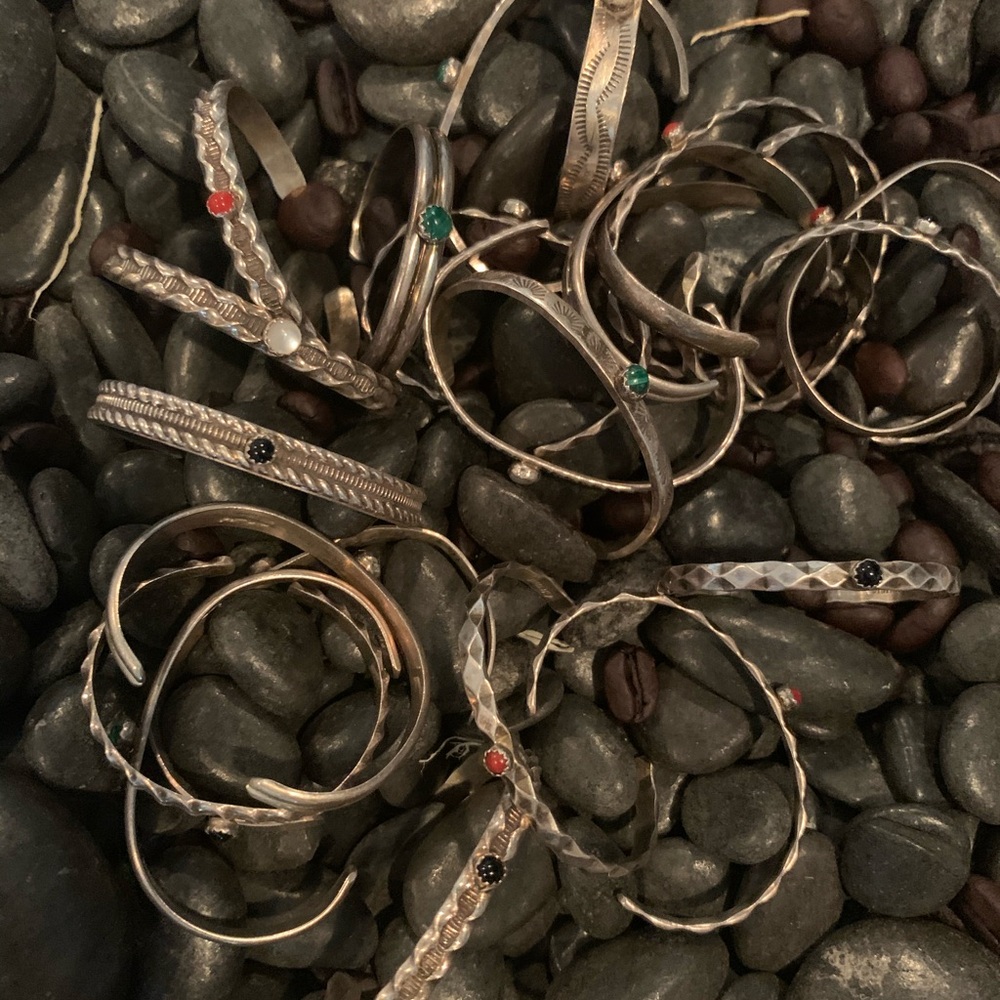 Bracelets, cuffs, baby bracelets, purses.  All range from $75-450